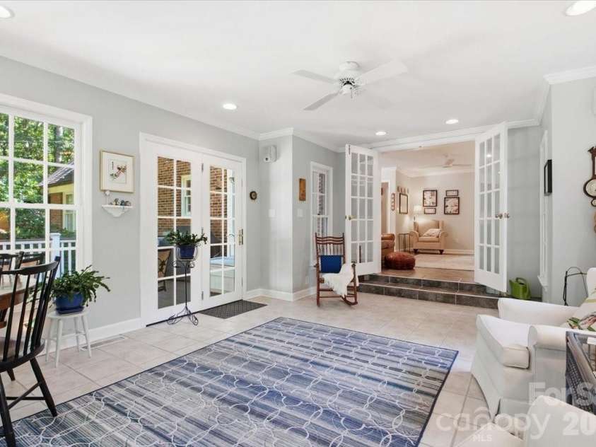 5138 Panhandle Circle, Matthews, NC 28104.  MLS# CAR4407389, YatesRealty ID 51282. Sun Room with Access to the Deck5138 Panhandle CirWeddington, NC 28104