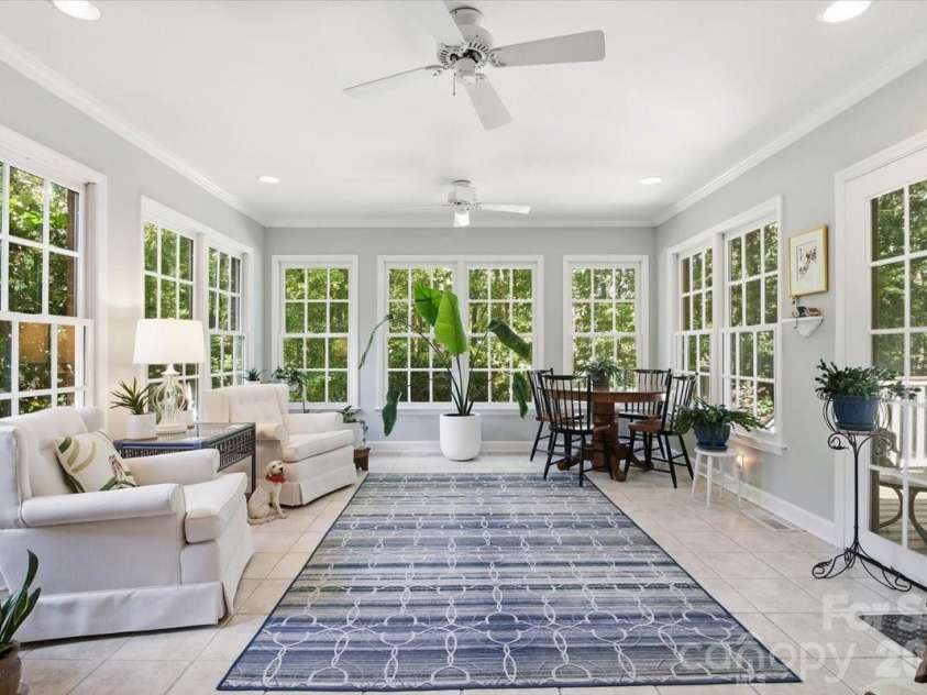 5138 Panhandle Circle, Matthews, NC 28104.  MLS# CAR4407389, YatesRealty ID 51282. Tiled Sun Room5138 Panhandle CirWeddington, NC 28104
