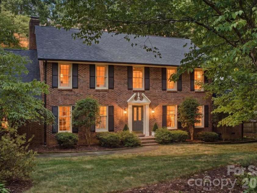 5138 Panhandle Circle, Matthews, NC 28104.  MLS# CAR4407389, YatesRealty ID 51282. Twilight Front Exterior5138 Panhandle CirWeddington, NC 28104