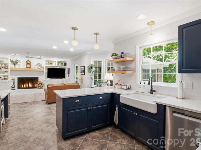 5138 Panhandle Circle, Matthews, NC 28104.  MLS# CAR4407389, YatesRealty ID 51282. Updated Kitchen with Quartz, Farmhouse Sink, Tile Backsplash5138 Panhandle CirWeddington, NC 28104