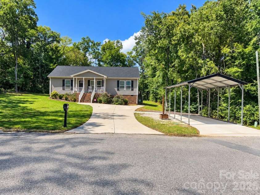 205 Lake Drive, Biscoe, NC 27209.  MLS# CAR4424943, YatesRealty ID 51286. 