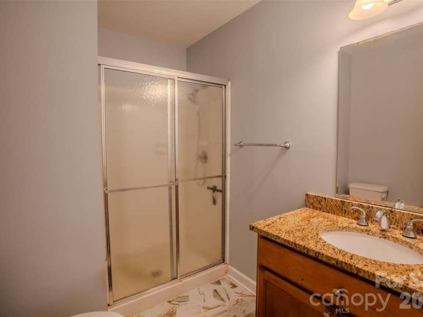 6516 Brynwood Drive, Charlotte, NC 28226.  MLS# CAR4424530, YatesRealty ID 51288. Downstairs Full Bath