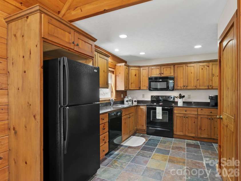 72 Cottontail Trail, Maggie Valley, NC 28751.  MLS# CAR4424527, YatesRealty ID 51292. Kitchen with custom cabinets.