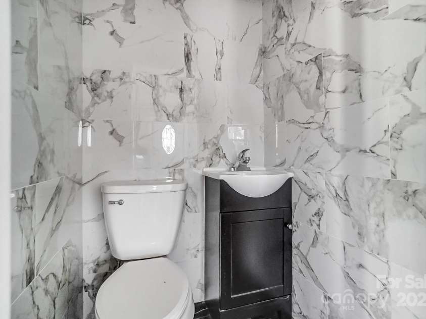 804 Rayon Street, Charlotte, NC 28216.  MLS# CAR4216209, YatesRealty ID 513. Half Bathroom