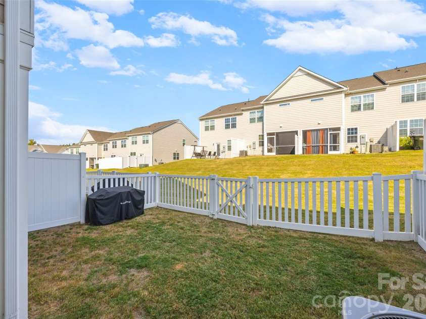 7035 Everly Commons Lane, Tega Cay, SC 29708.  MLS# CAR4415741, YatesRealty ID 51319. Fenced in Backyard