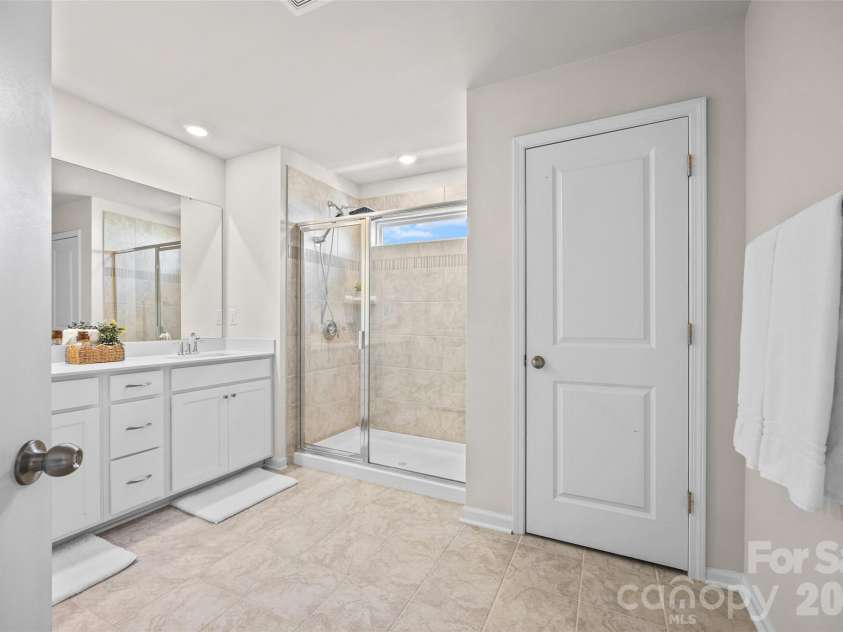 7035 Everly Commons Lane, Tega Cay, SC 29708.  MLS# CAR4415741, YatesRealty ID 51319. Primary Bathroom