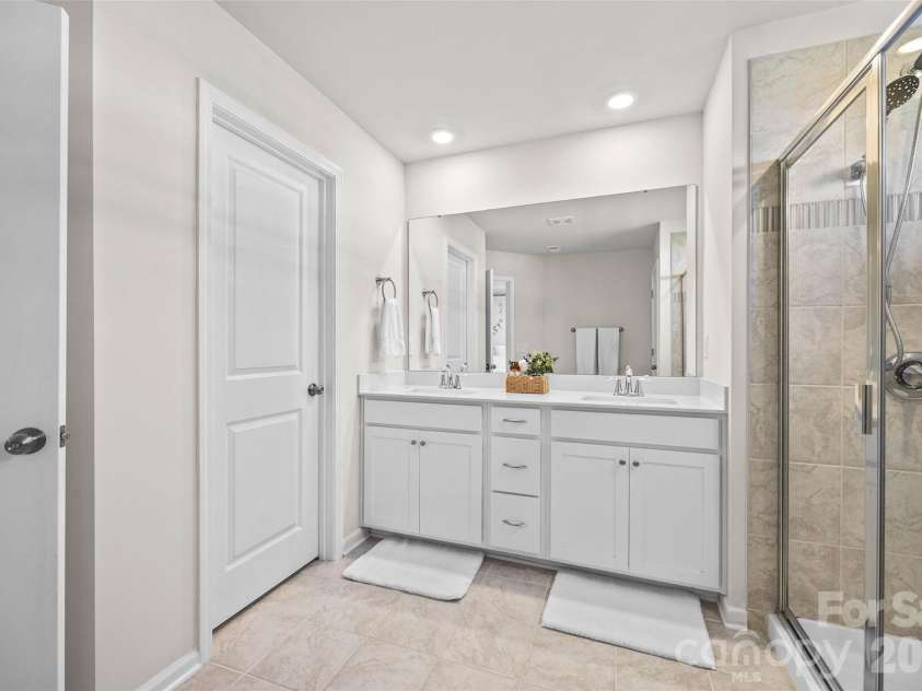 7035 Everly Commons Lane, Tega Cay, SC 29708.  MLS# CAR4415741, YatesRealty ID 51319. Primary Bathroom with Double Vanity