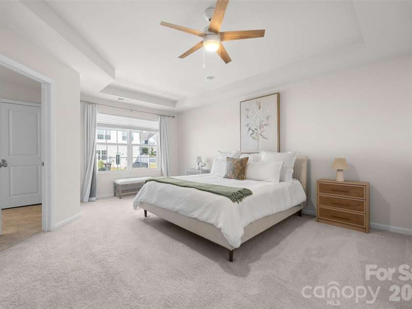 7035 Everly Commons Lane, Tega Cay, SC 29708.  MLS# CAR4415741, YatesRealty ID 51319. Primary Bedroom with Tray Ceiling