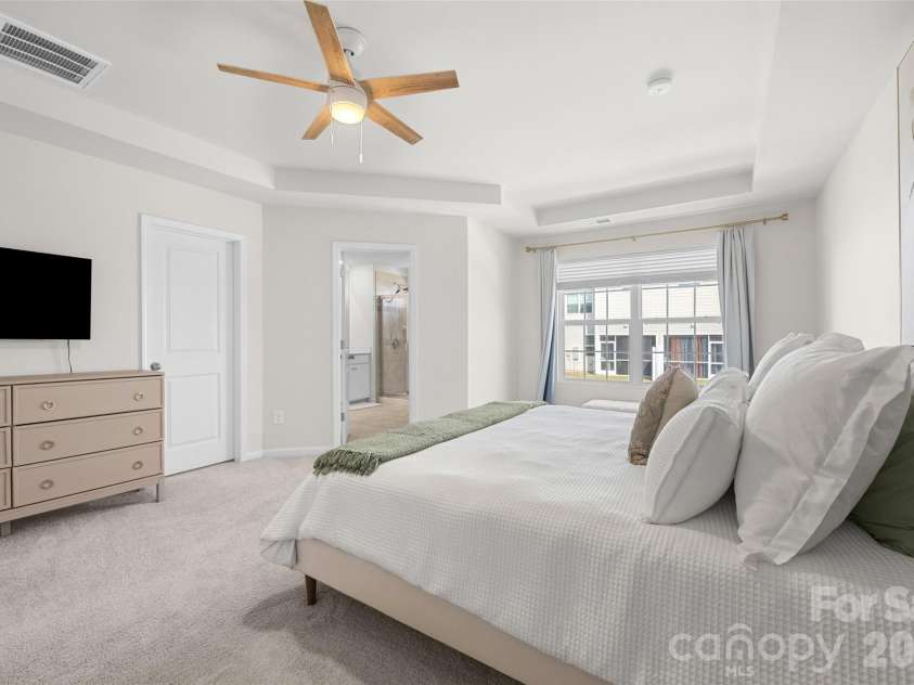 7035 Everly Commons Lane, Tega Cay, SC 29708.  MLS# CAR4415741, YatesRealty ID 51319. Primary Bedroom with Tray Ceiling