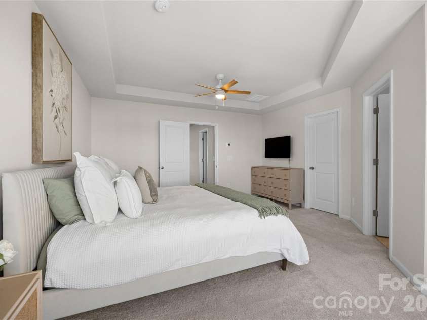 7035 Everly Commons Lane, Tega Cay, SC 29708.  MLS# CAR4415741, YatesRealty ID 51319. Primary Bedroom with Tray Ceiling
