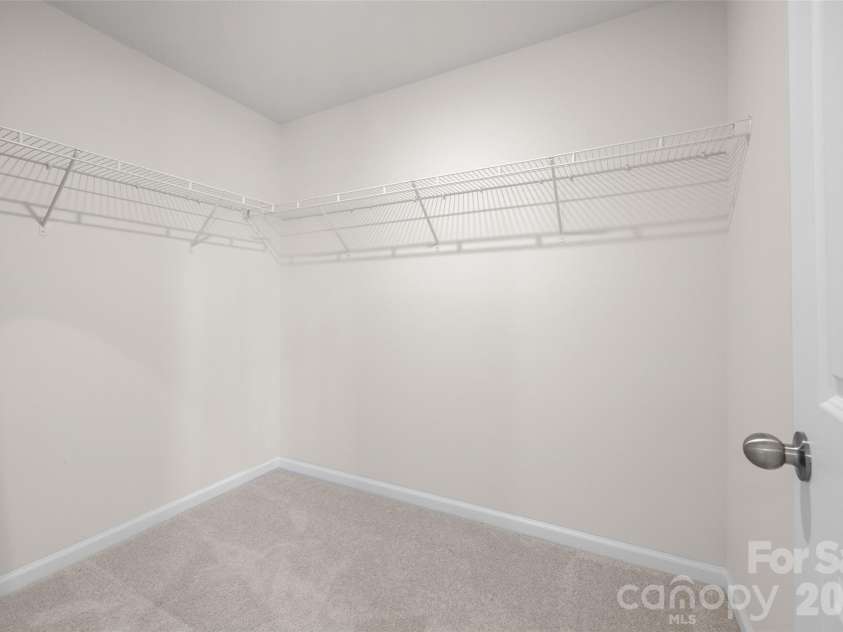 7035 Everly Commons Lane, Tega Cay, SC 29708.  MLS# CAR4415741, YatesRealty ID 51319. Primary Closet