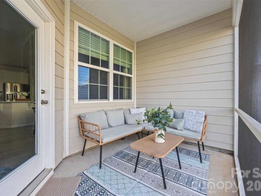 7035 Everly Commons Lane, Tega Cay, SC 29708.  MLS# CAR4415741, YatesRealty ID 51319. Screened in Porch