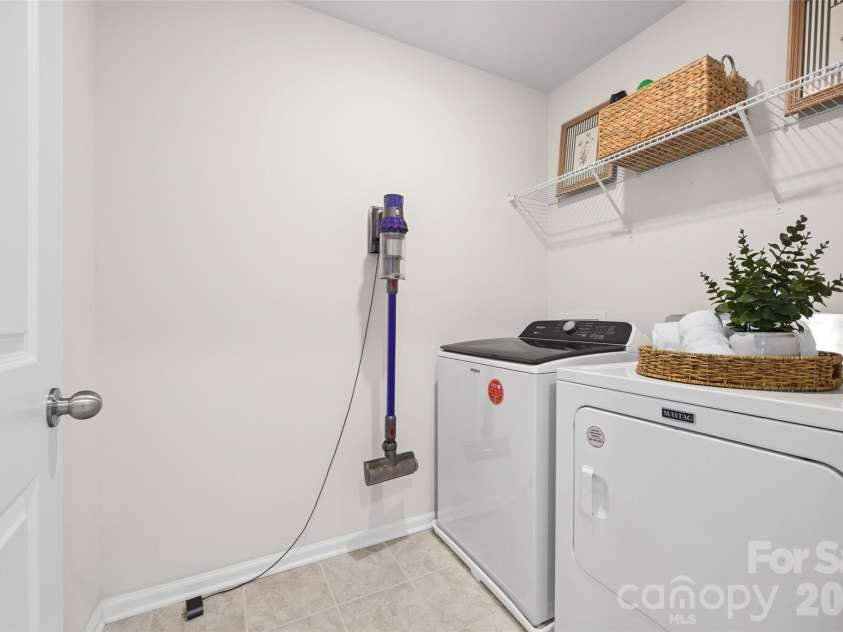 7035 Everly Commons Lane, Tega Cay, SC 29708.  MLS# CAR4415741, YatesRealty ID 51319. Upstairs Laundry