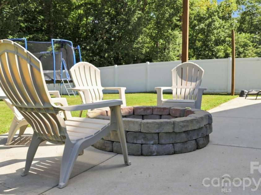 3103 Winesap Drive, Dallas, NC 28034.  MLS# CAR4425625, YatesRealty ID 51332. Built-in Firepit
