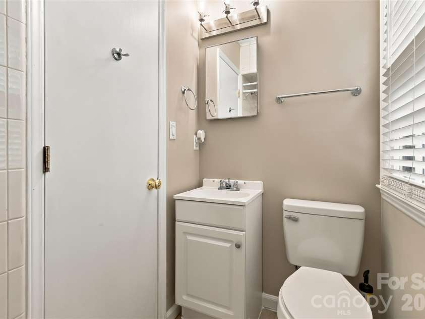 2711 Johnny Reb Lane, Charlotte, NC 28273.  MLS# CAR4425742, YatesRealty ID 51337. Lower level bathroom