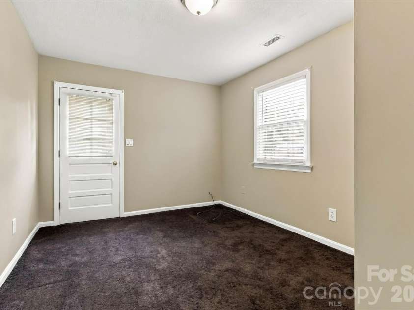 2711 Johnny Reb Lane, Charlotte, NC 28273.  MLS# CAR4425742, YatesRealty ID 51337. Lower level bedroom