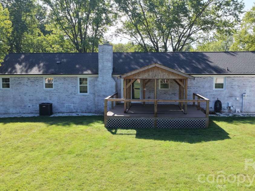 4410 Coddle Creek Drive, Concord, NC 28027.  MLS# CAR4422400, YatesRealty ID 51340. Back of home