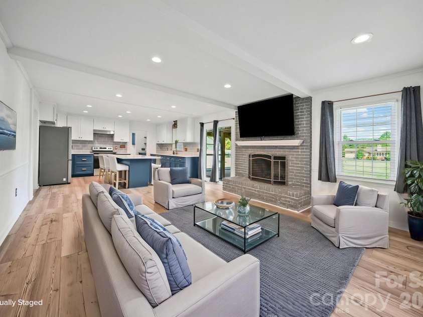 4410 Coddle Creek Drive, Concord, NC 28027.  MLS# CAR4422400, YatesRealty ID 51340. Digitally enhanced staging of main living space