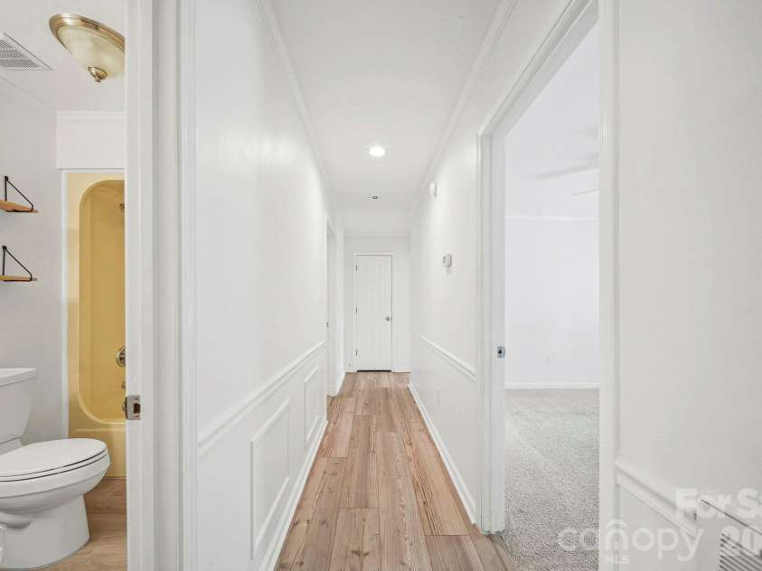 4410 Coddle Creek Drive, Concord, NC 28027.  MLS# CAR4422400, YatesRealty ID 51340. Hallway to bedroooms and full bath