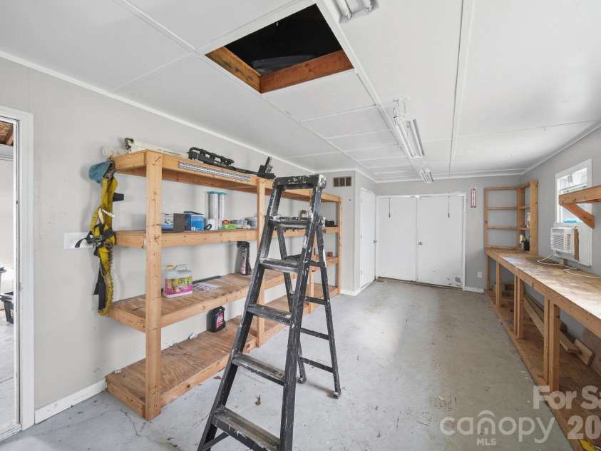 4410 Coddle Creek Drive, Concord, NC 28027.  MLS# CAR4422400, YatesRealty ID 51340. Inside detached garage