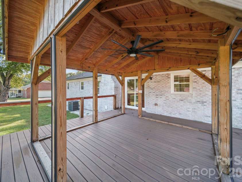 4410 Coddle Creek Drive, Concord, NC 28027.  MLS# CAR4422400, YatesRealty ID 51340. Inside pergola