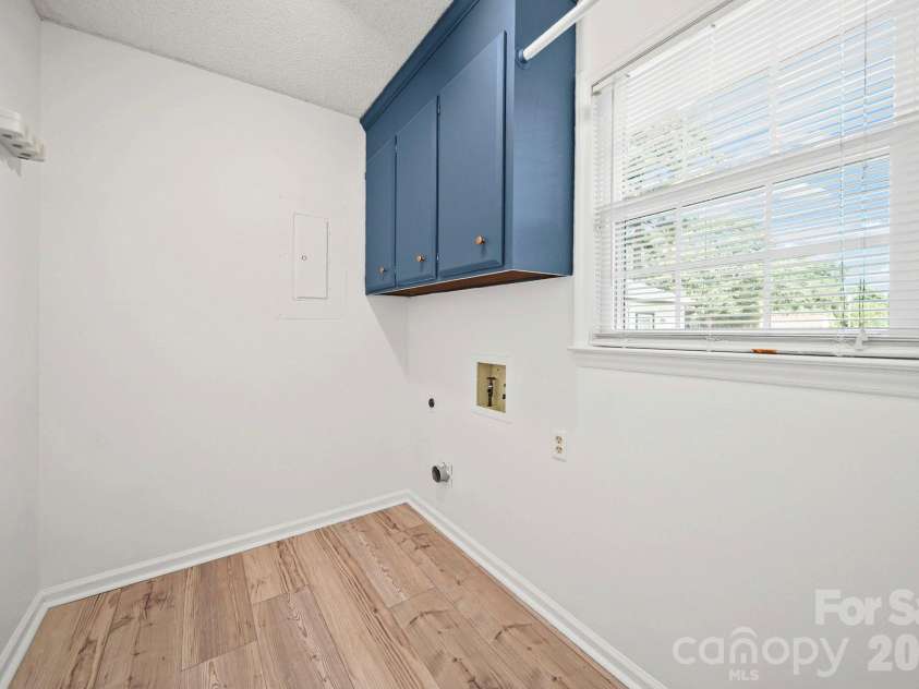 4410 Coddle Creek Drive, Concord, NC 28027.  MLS# CAR4422400, YatesRealty ID 51340. Laundry room