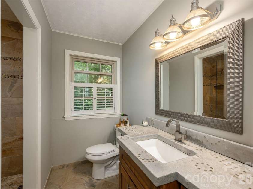 906 Indian Hill Road, Hendersonville, NC 28792.  MLS# CAR4425706, YatesRealty ID 51354. Bath with artists countertop