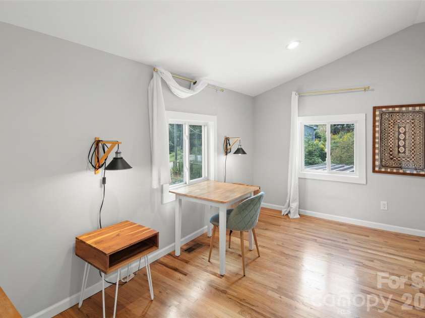 28 Long Cove Road, Candler, NC 28715.  MLS# CAR4425807, YatesRealty ID 51360. Laundry and half bath