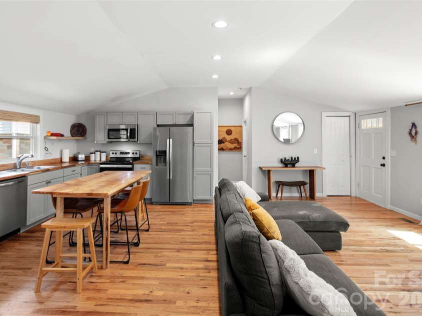28 Long Cove Road, Candler, NC 28715.  MLS# CAR4425807, YatesRealty ID 51360. Open concept for entertaining