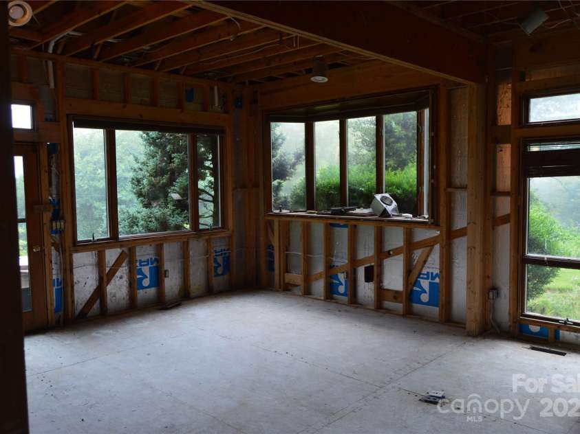 5 Meadow Ridge Drive, Asheville, NC 28804.  MLS# CAR4224351, YatesRealty ID 5137. Demo in primary bedroom