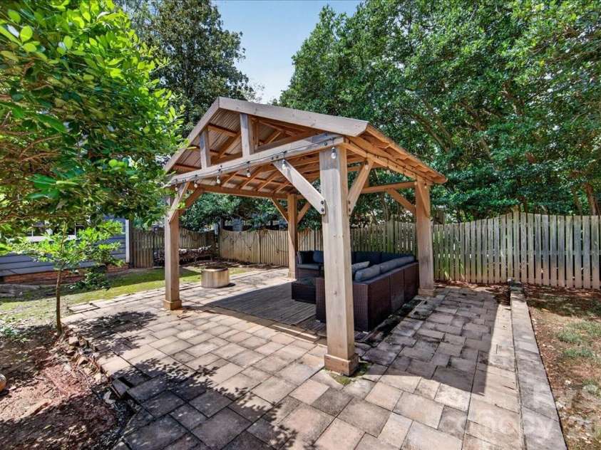 4509 Mullens Ford Road, Charlotte, NC 28226.  MLS# CAR4425762, YatesRealty ID 51379. Covered Outdoor Seating