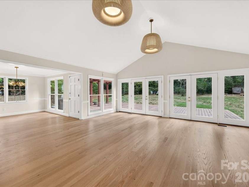 4509 Mullens Ford Road, Charlotte, NC 28226.  MLS# CAR4425762, YatesRealty ID 51379. Great Room walks out to Deck