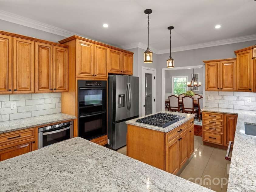 349 View Rock Lane, Hendersonville, NC 28791.  MLS# CAR4422786, YatesRealty ID 51384. Double wall ovens and pantry