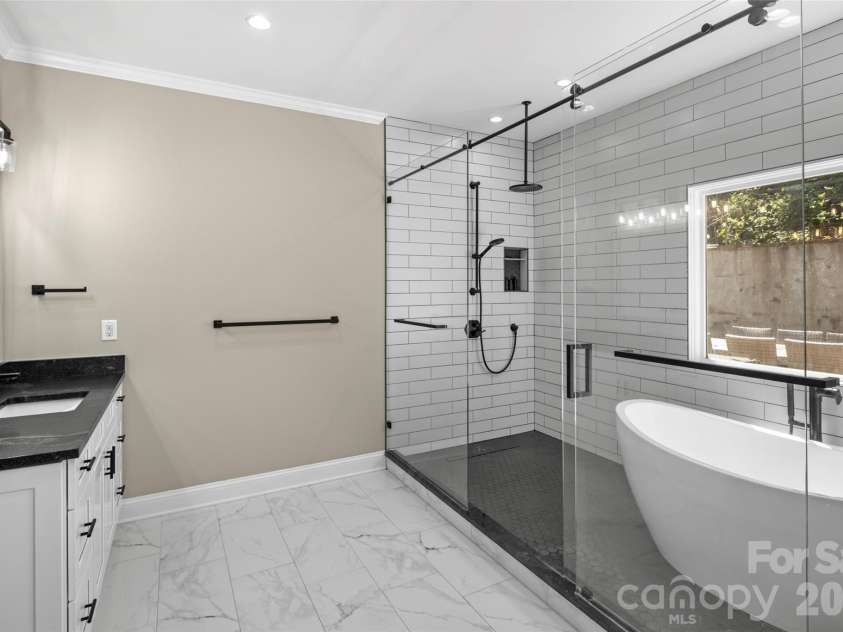349 View Rock Lane, Hendersonville, NC 28791.  MLS# CAR4422786, YatesRealty ID 51384. Spacious primary bath with double vanities