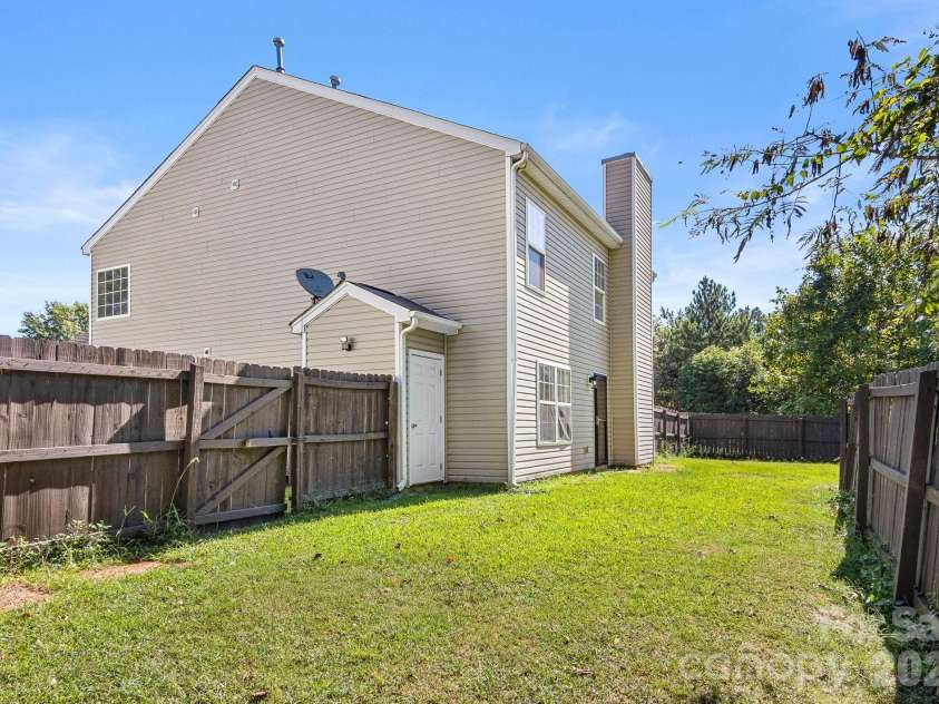 1153 Delander Lane, Charlotte, NC 28214.  MLS# CAR4424709, YatesRealty ID 51391. Backyard storage room area