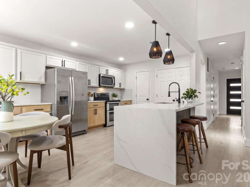 1153 Delander Lane, Charlotte, NC 28214.  MLS# CAR4424709, YatesRealty ID 51391. Quartz waterfall countertop