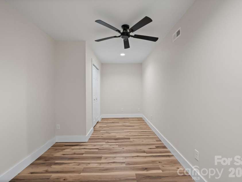 156 State Street, Asheville, NC 28806.  MLS# CAR4423069, YatesRealty ID 51393. Flex Room 2: Additional finished flex room with closet for added versatility.