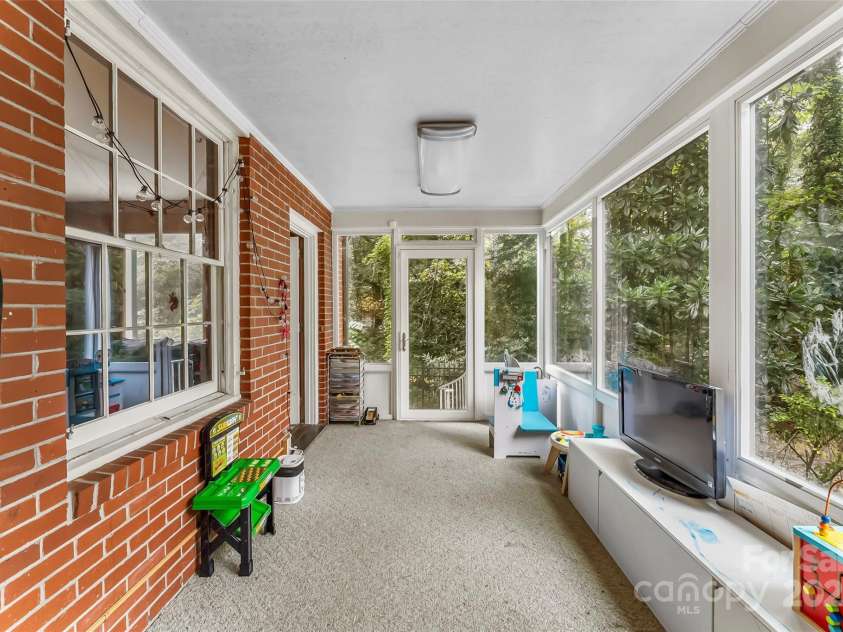 301 Louise Avenue, Valdese, NC 28690.  MLS# CAR4307107, YatesRealty ID 514. Main level sunroom