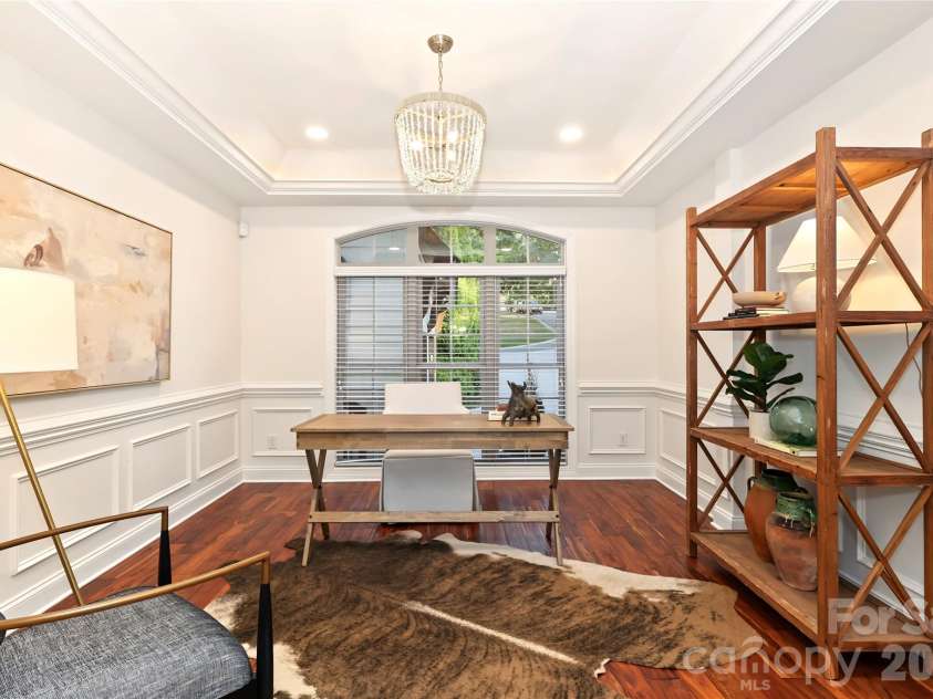 4934 Spalding Place, Charlotte, NC 28226.  MLS# CAR4423494, YatesRealty ID 51423. Convenient office or lounge area that can be closed off with pocket doors.