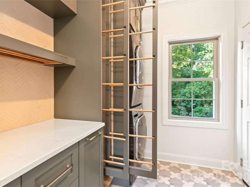 4934 Spalding Place, Charlotte, NC 28226.  MLS# CAR4423494, YatesRealty ID 51423. Love these drying racks!