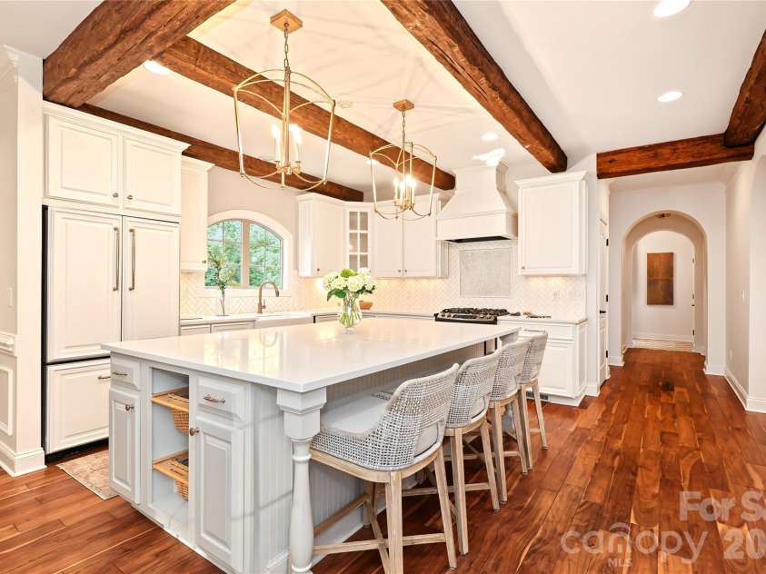 4934 Spalding Place, Charlotte, NC 28226.  MLS# CAR4423494, YatesRealty ID 51423. Open kitchen looking down the hall towards the scullery and the Laundry