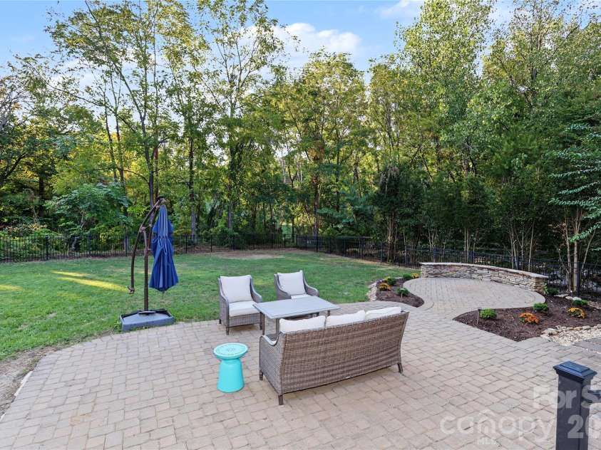 4934 Spalding Place, Charlotte, NC 28226.  MLS# CAR4423494, YatesRealty ID 51423. Patio with large fenced backyard