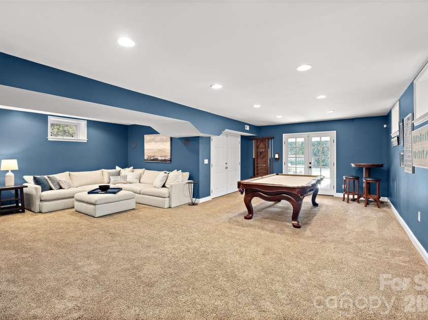 3016 Idlewood Circle, Charlotte, NC 28209.  MLS# CAR4357842, YatesRealty ID 5143. Recreation and billiard room are oversized on lower level with half bath. 