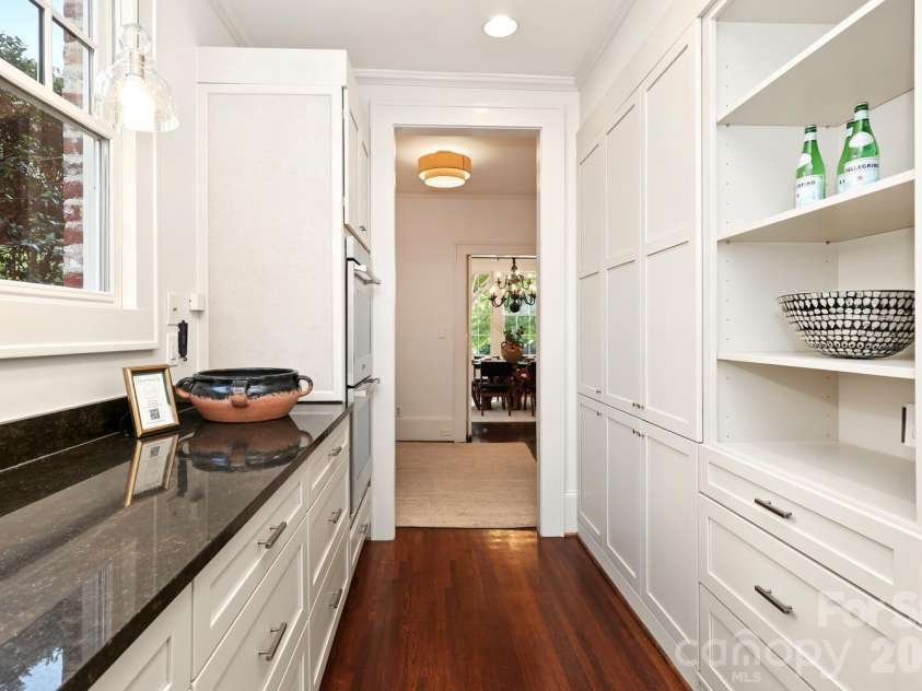 723 Berkeley Avenue, Charlotte, NC 28203.  MLS# CAR4422867, YatesRealty ID 51432. Custom cabinetry with great storage