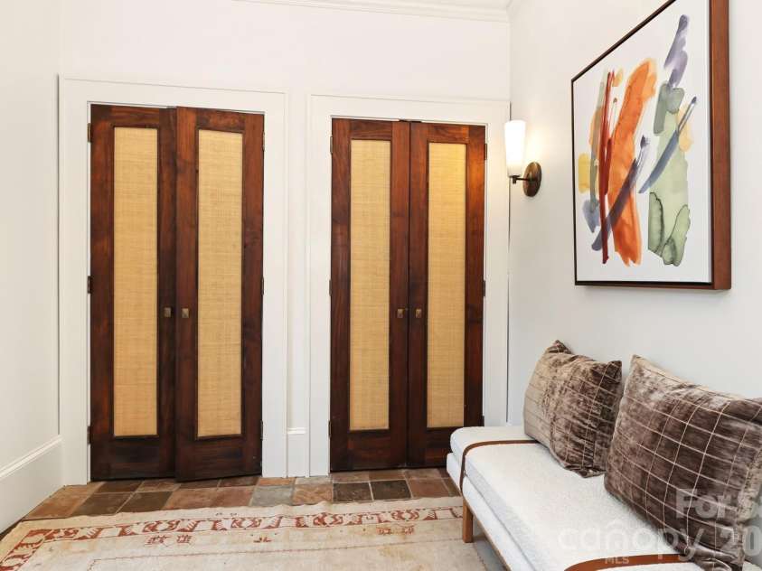 723 Berkeley Avenue, Charlotte, NC 28203.  MLS# CAR4422867, YatesRealty ID 51432. Mud room with custom doors and storage