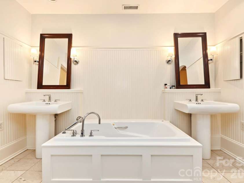 723 Berkeley Avenue, Charlotte, NC 28203.  MLS# CAR4422867, YatesRealty ID 51432. Primary bath with dual sinks and soaking tub