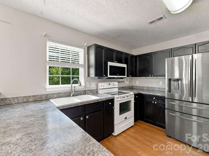 14306 Blue Grass Drive, Huntersville, NC 28078.  MLS# CAR4425886, YatesRealty ID 51437. 