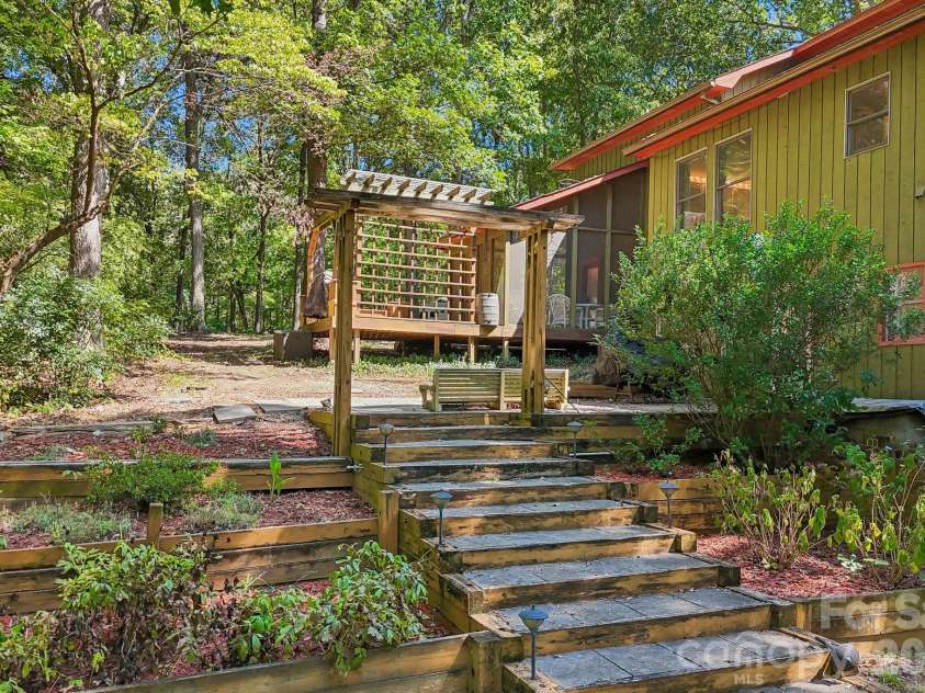 2701 Cedar Trail Lane, Wingate, NC 28174.  MLS# CAR4422344, YatesRealty ID 51449. Backyard garden/deck, perfect for entertaining!