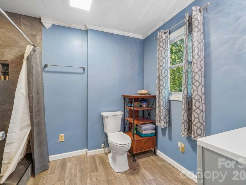 2701 Cedar Trail Lane, Wingate, NC 28174.  MLS# CAR4422344, YatesRealty ID 51449. Basement full bathroom, perfect for guests!