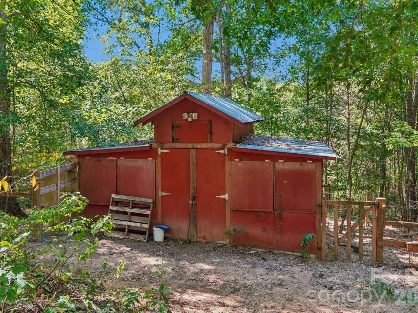 2701 Cedar Trail Lane, Wingate, NC 28174.  MLS# CAR4422344, YatesRealty ID 51449. Chicken coop/barn, already fenced-in.